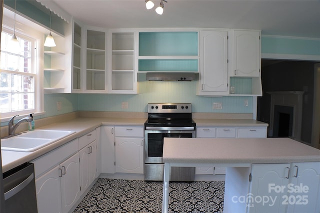 kitchen featuring a sink, white cabinets, appliances with stainless steel finishes, range hood, and open shelves