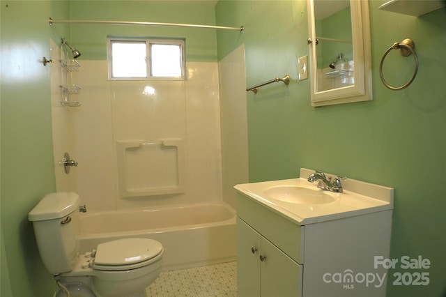 bathroom featuring vanity, toilet, and bathing tub / shower combination