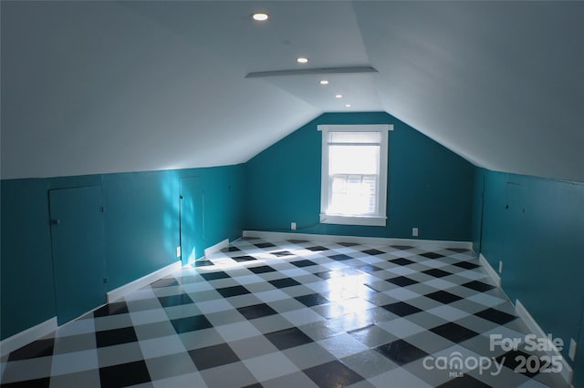 bonus room with lofted ceiling, baseboards, and recessed lighting