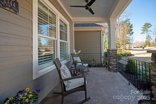 view of patio with a porch and ceiling fan