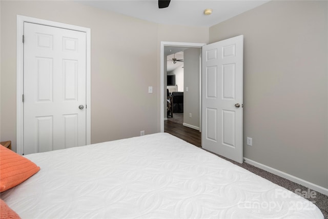 bedroom featuring ceiling fan and baseboards