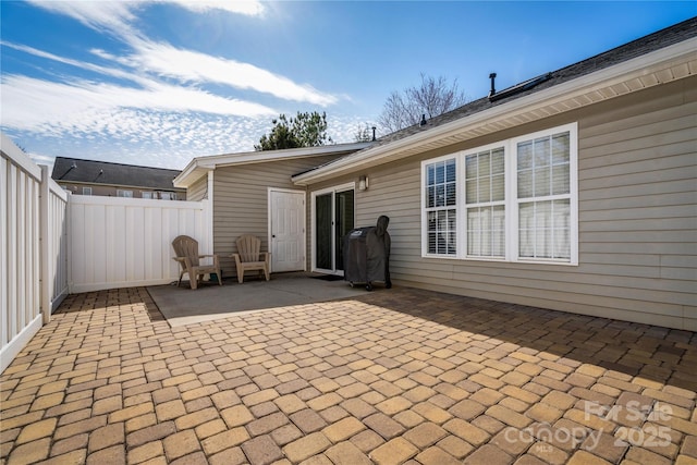 view of patio / terrace with a fenced backyard and grilling area