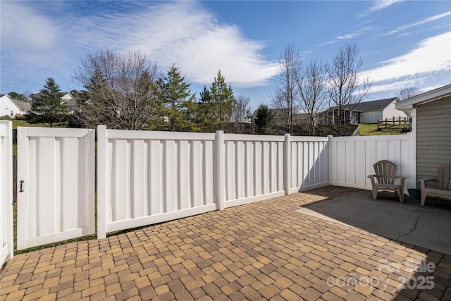 view of patio featuring a fenced backyard