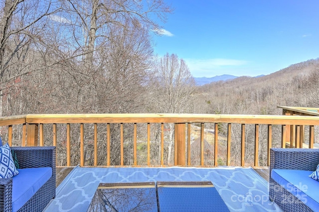 deck featuring a mountain view