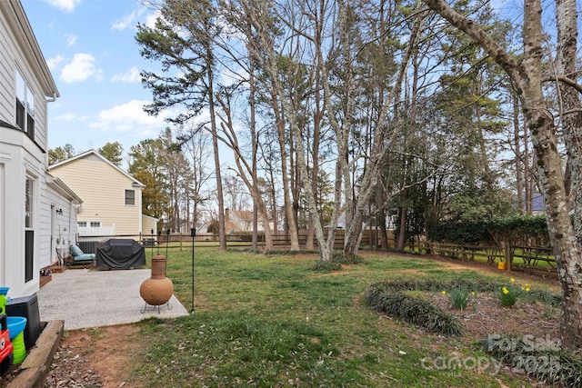 view of yard featuring a fenced backyard and a patio