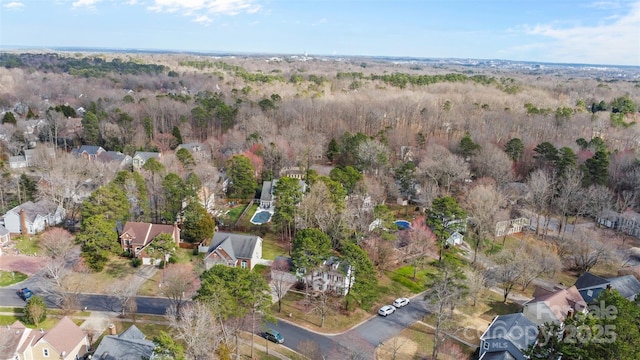 birds eye view of property with a residential view