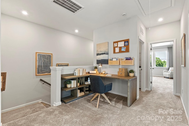 office with recessed lighting, attic access, visible vents, and light colored carpet