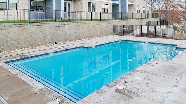 pool featuring fence