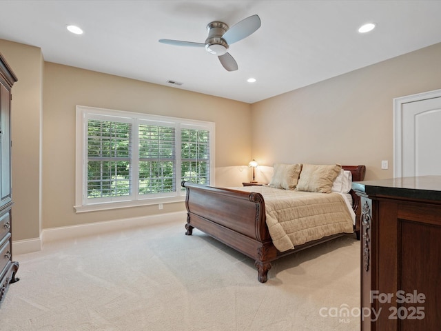 bedroom with light carpet, baseboards, visible vents, and recessed lighting