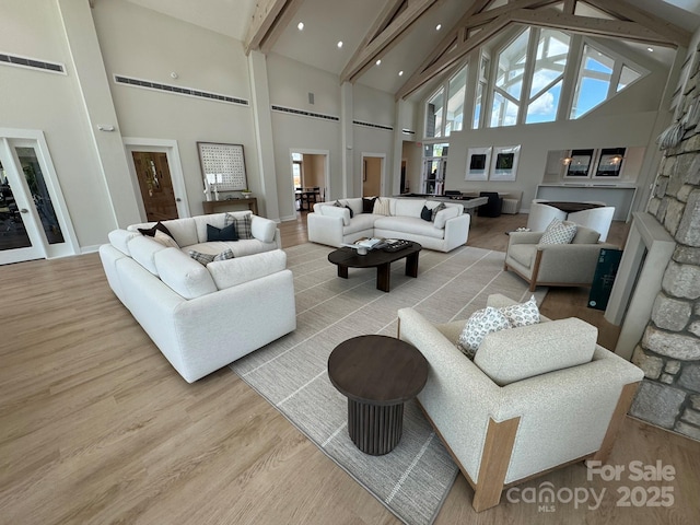 7441 Fighting Creek Rd Unit 30, Sherrills Ford, NC 28673 - living room with high vaulted ceiling, wood finished floors, and beam ceiling