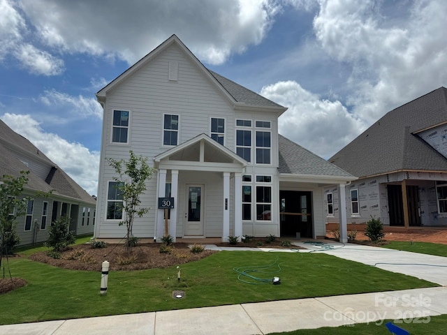 7441 Fighting Creek Rd Unit 30, Sherrills Ford, NC 28673 - view of front of home with a front lawn and roof with shingles