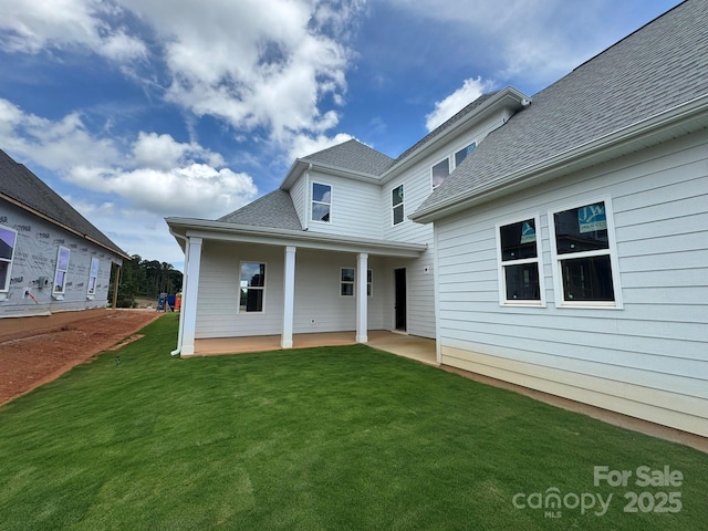 7441 Fighting Creek Rd Unit 30, Sherrills Ford, NC 28673 - rear view of house with a lawn, a patio, and a shingled roof