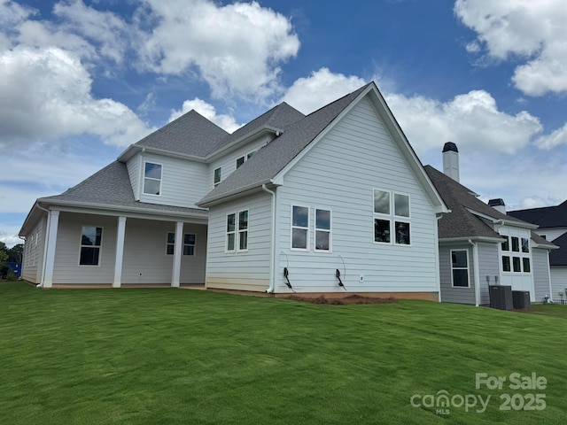 7441 Fighting Creek Rd Unit 30, Sherrills Ford, NC 28673 - back of property featuring a lawn, a shingled roof, and a porch