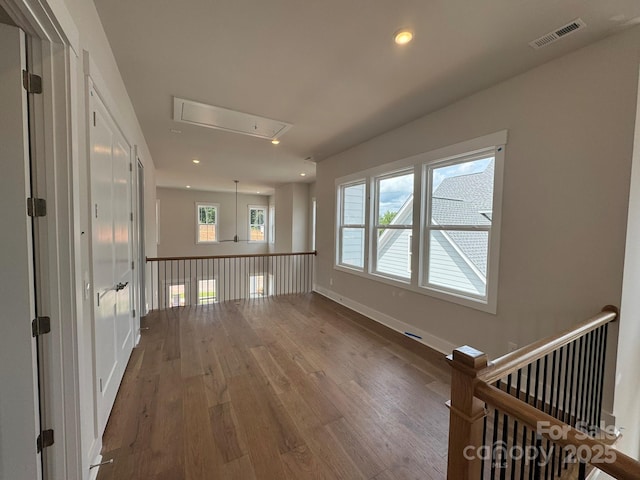 7441 Fighting Creek Rd Unit 30, Sherrills Ford, NC 28673 - unfurnished room with attic access, wood finished floors, and recessed lighting