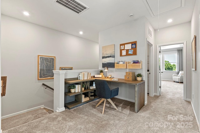 office featuring light carpet, recessed lighting, visible vents, and attic access