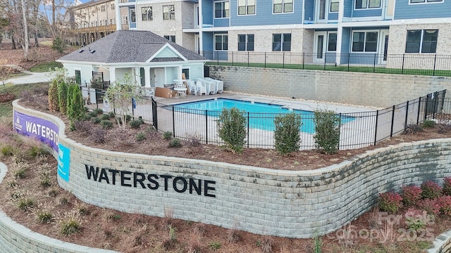 community pool with fence