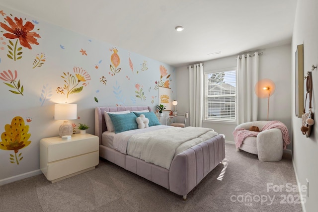 carpeted bedroom with baseboards and wallpapered walls