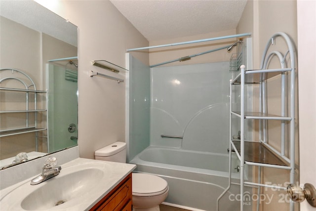 full bathroom featuring toilet, a textured ceiling, vanity, and shower / bathing tub combination