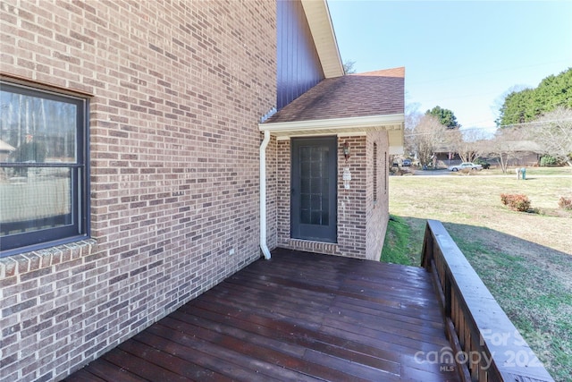 deck featuring a lawn