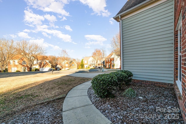 view of yard with a residential view