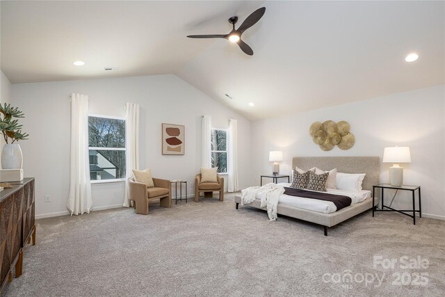 bedroom with vaulted ceiling, ceiling fan, carpet flooring, and baseboards