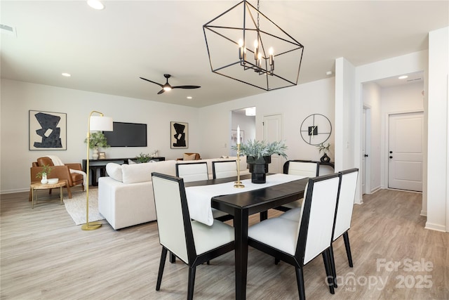 dining area featuring recessed lighting, baseboards, ceiling fan, and light wood finished floors