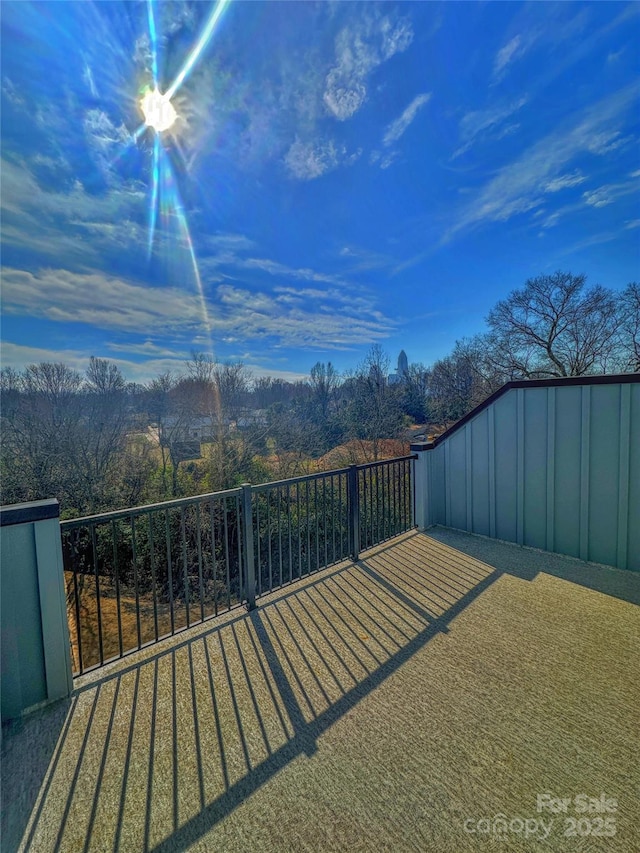 view of yard with a balcony