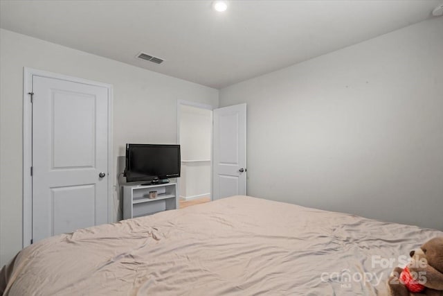 bedroom with visible vents