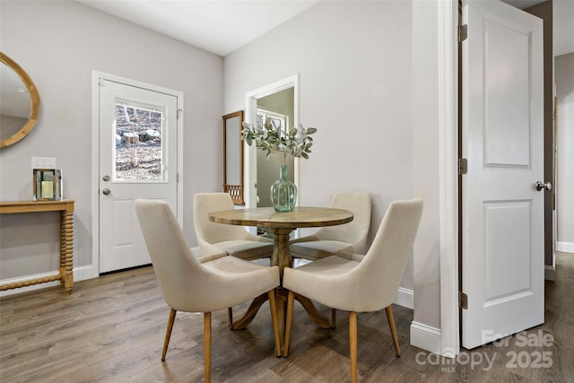 215 David Ridge Rd, Black Mountain, NC 28711 - dining room with wood finished floors and baseboards