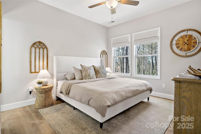 215 David Ridge Rd, Black Mountain, NC 28711 - bedroom featuring ceiling fan, light wood finished floors, and baseboards