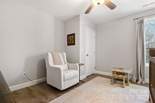 215 David Ridge Rd, Black Mountain, NC 28711 - living area featuring dark wood-style floors, ceiling fan, visible vents, and baseboards