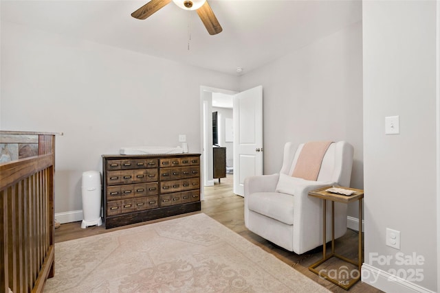 215 David Ridge Rd, Black Mountain, NC 28711 - sitting room featuring wood finished floors, a ceiling fan, and baseboards