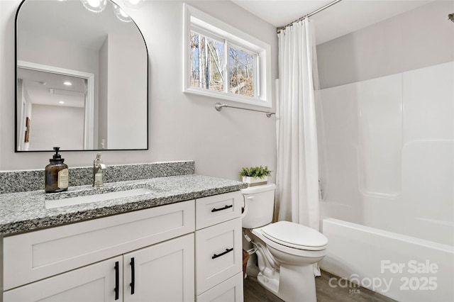 215 David Ridge Rd, Black Mountain, NC 28711 - full bath featuring vanity, wood finished floors, shower / bath combo with shower curtain, and toilet