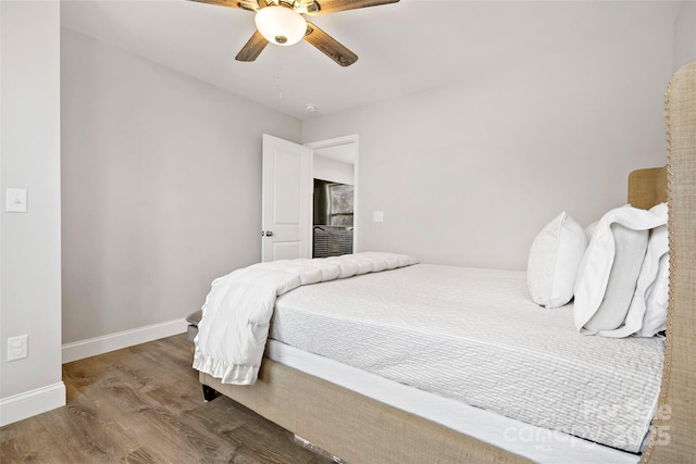215 David Ridge Rd, Black Mountain, NC 28711 - bedroom with a ceiling fan, baseboards, and wood finished floors