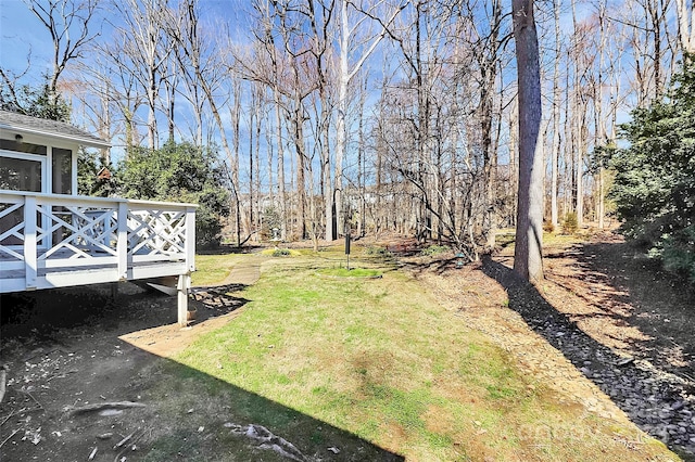 view of yard featuring a deck