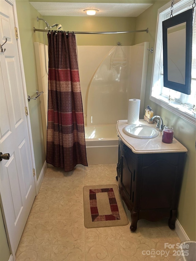 337 Knollwood Dr, Forest City, NC 28043 - bathroom featuring tile patterned floors, shower / bathtub combination with curtain, baseboards, and vanity