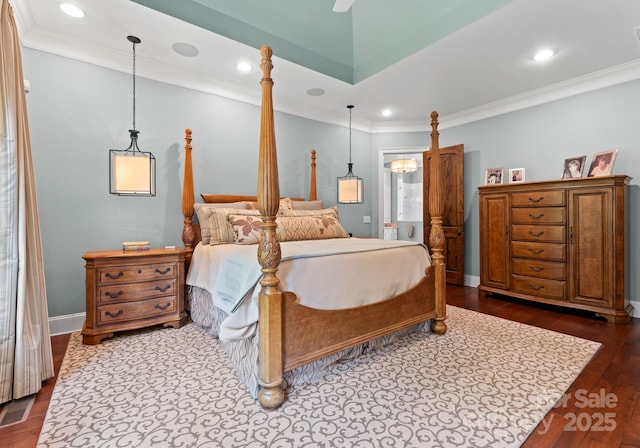 bedroom with baseboards, dark wood-type flooring, recessed lighting, and crown molding