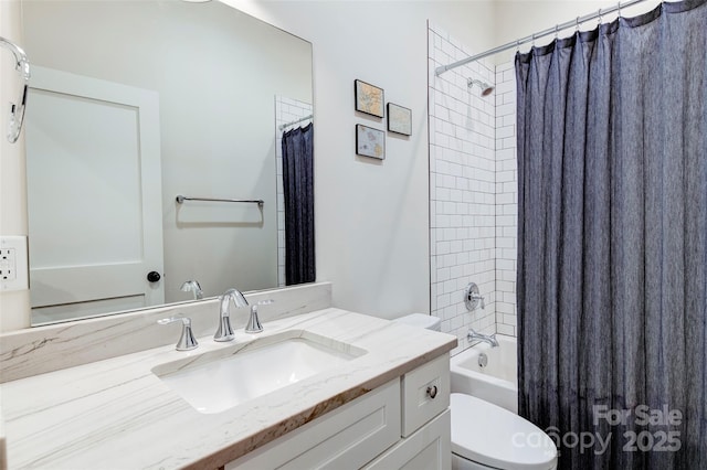 bathroom featuring shower / bath combo, vanity, and toilet