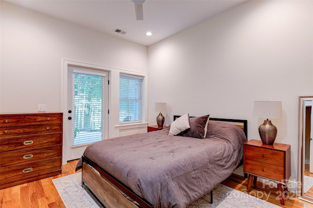 bedroom with recessed lighting, a ceiling fan, visible vents, access to outside, and light wood-type flooring