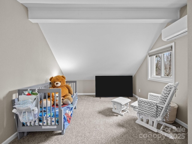 bedroom with a wall unit AC, baseboards, and vaulted ceiling