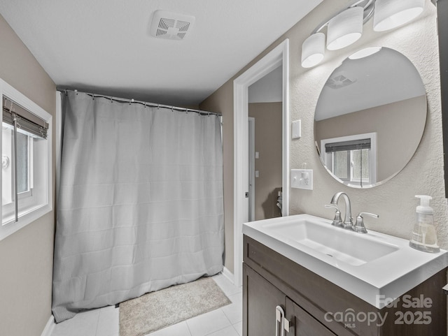 full bath with tile patterned floors, visible vents, vanity, and a shower with curtain