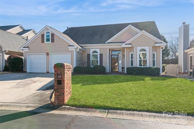 view of front facade featuring concrete driveway, a front lawn, roof with shingles, and an attached garage