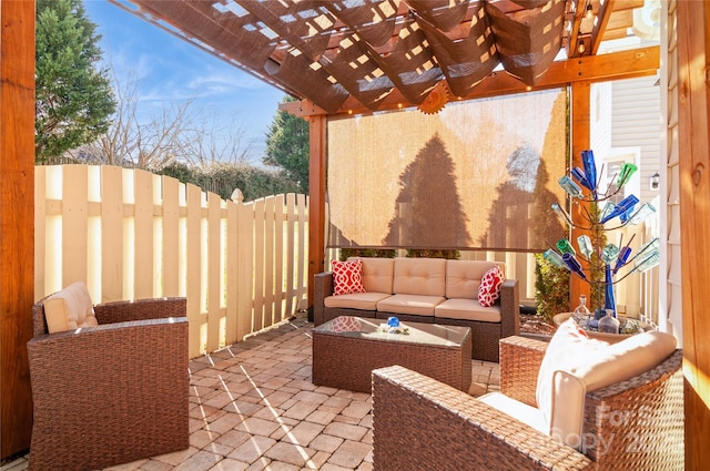 view of patio / terrace featuring outdoor lounge area, fence, and a pergola