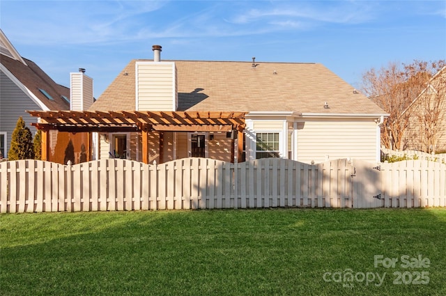 rear view of house featuring a fenced front yard, a lawn, and a pergola