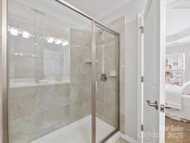 full bath with ensuite bathroom, a shower stall, and crown molding