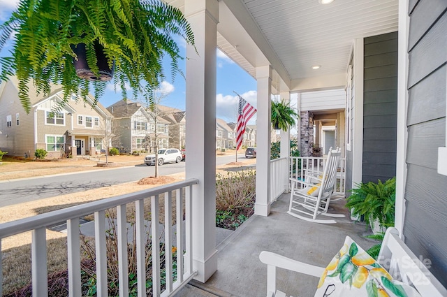 view of patio / terrace featuring covered porch and a residential view