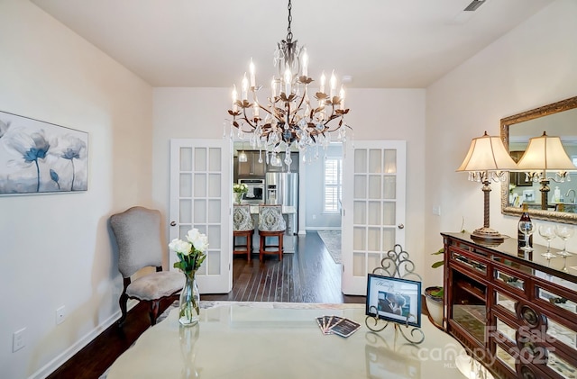 office area featuring baseboards and wood finished floors