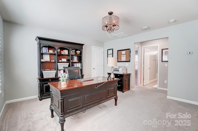 office space with light carpet, a notable chandelier, and baseboards