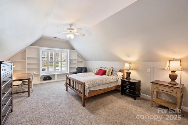 carpeted bedroom with a ceiling fan, lofted ceiling, visible vents, and baseboards