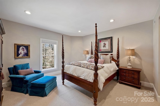 bedroom with light carpet, recessed lighting, and baseboards